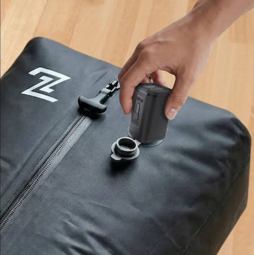 Rechargeable mini air pump for travel bag compression